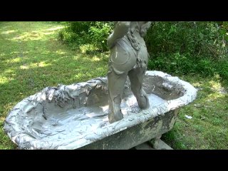 little mina is up close in the mud tub